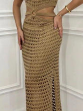 Close-up of stomach cutout and side slit hem in taupe Zalithé™ Sweater Dress, showing rich knit texture.