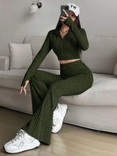 Zarisa Ribbed Zip Up Bootcut Duo army green seated lounging on the couch taking a selfie photo