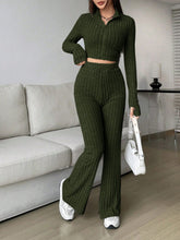Zarisa Ribbed Zip Up Bootcut Duo army green styled with sneakers and accessories