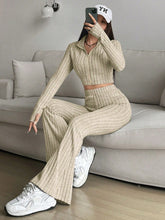 Zarisa Ribbed Zip Up Bootcut Duo khaki seated lounging on the couch