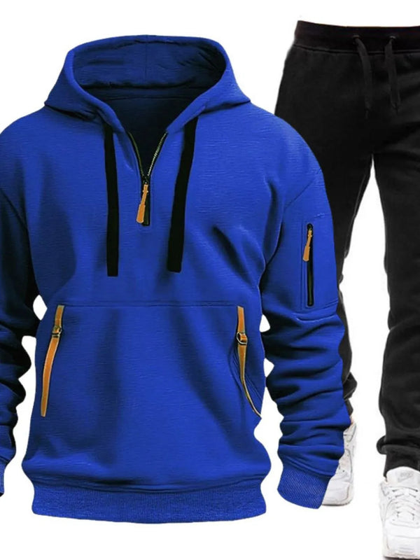 Royal Blue Zayric StrikeFlex Set — front view featuring half-zip hoodie with contrast zippers, kangaroo pocket, arm pocket, and tapered-leg pants