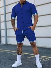 Men’s plus size Zayric StripeEdge button-up top and shorts set in royal blue — front view styled with white sneakers.