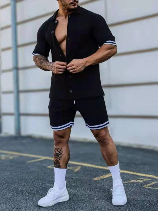 Side view of men’s plus size Zayric StripeEdge button-up top and shorts set in black — highlighting button closure and stripe sleeve detail.