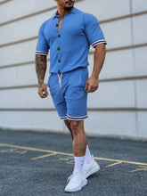 Side view of men’s plus size Zayric StripeEdge button-up top and shorts set in light blue — highlighting button closure and stripe sleeve detail.