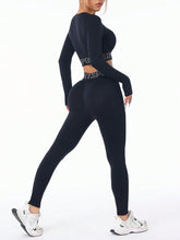 Rear view of ZephyrCore MotifFit Active Set in black, highlighting smooth compression fit and back seamless detail.